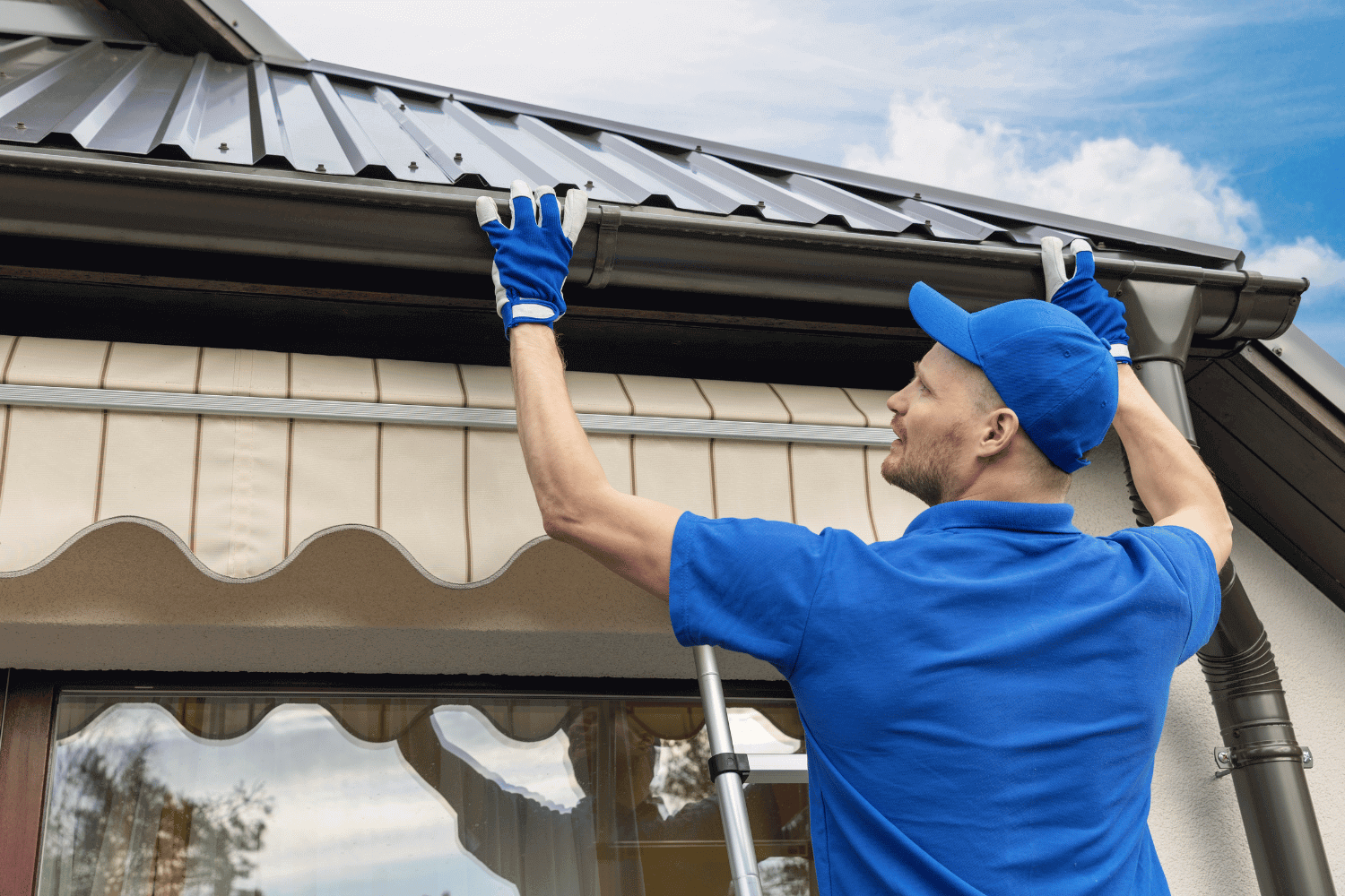 A photo showing the installation of protective layers during roof replacement