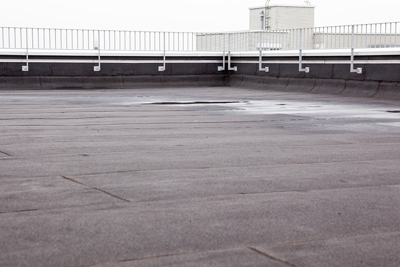 Flat roof white railing