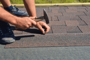 Illustration of proper alignment and nailing techniques for asphalt shingles