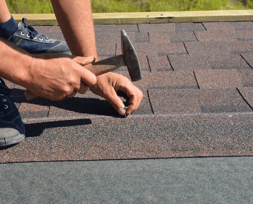 Illustration of proper alignment and nailing techniques for asphalt shingles