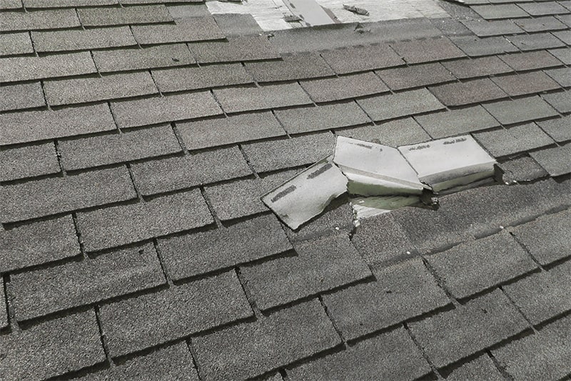 Illustration of roof storm damage