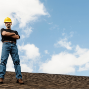 A professional roofer providing consultation services