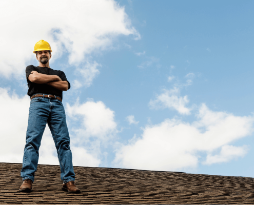 A professional roofer providing consultation services