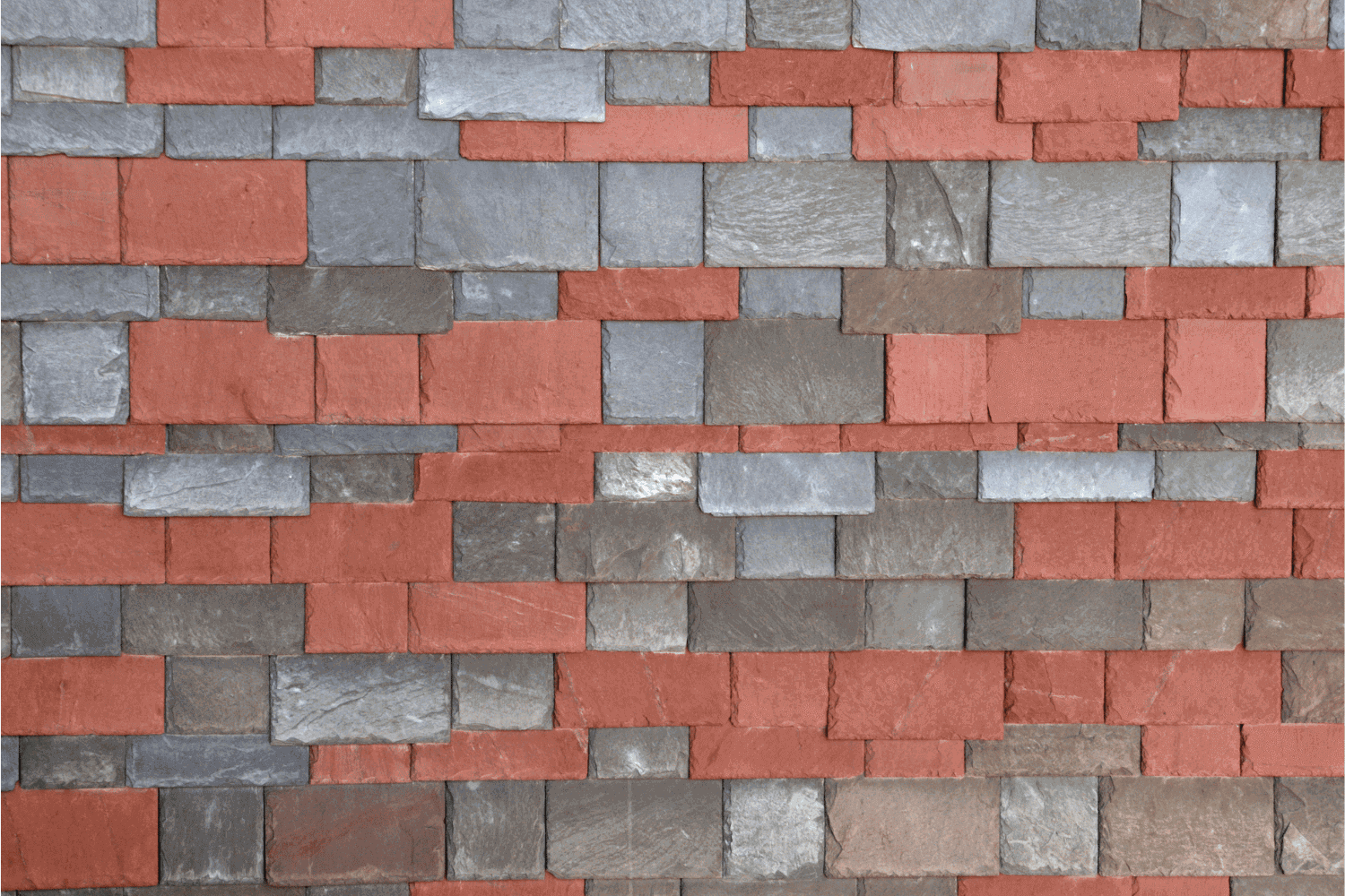 An image showing a house with multiple layers of shingles on the roof