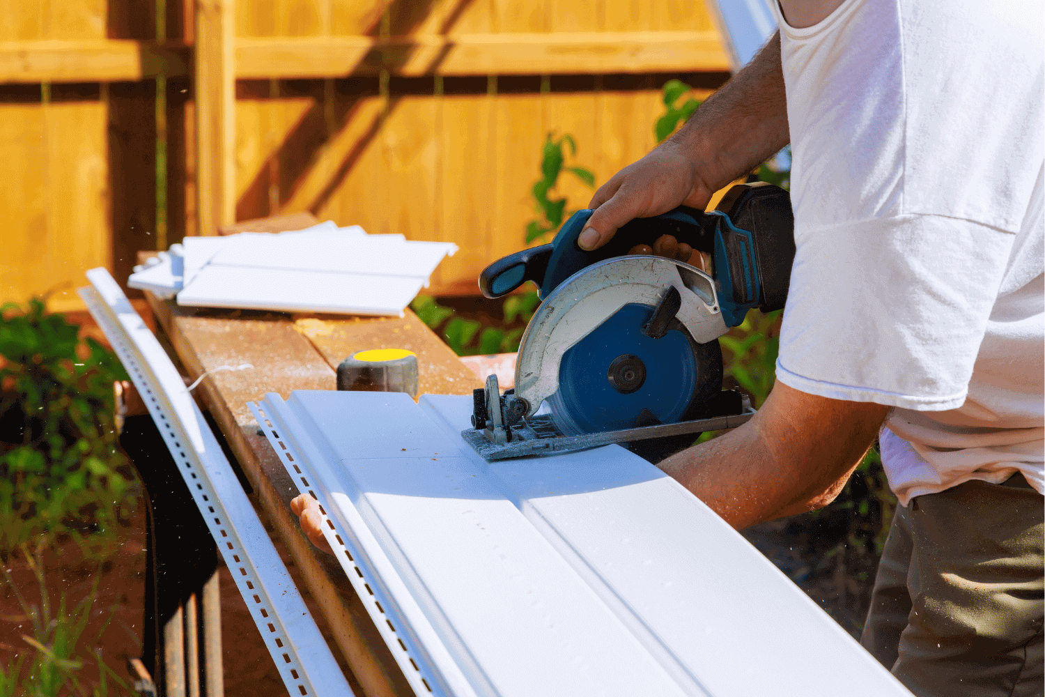 Installing the starter strip for vinyl siding.