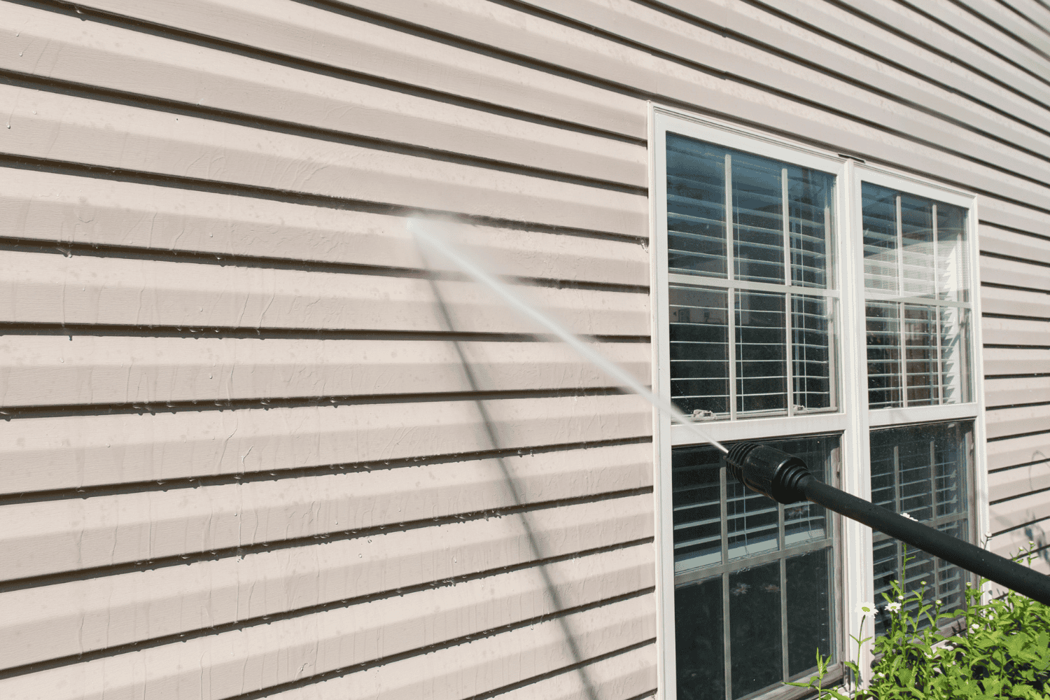 An image illustrating proper care and maintenance techniques for vinyl siding.