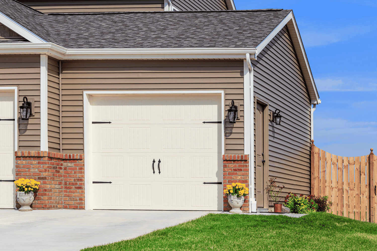 A comparative image showing vinyl siding next to wood and metal siding.