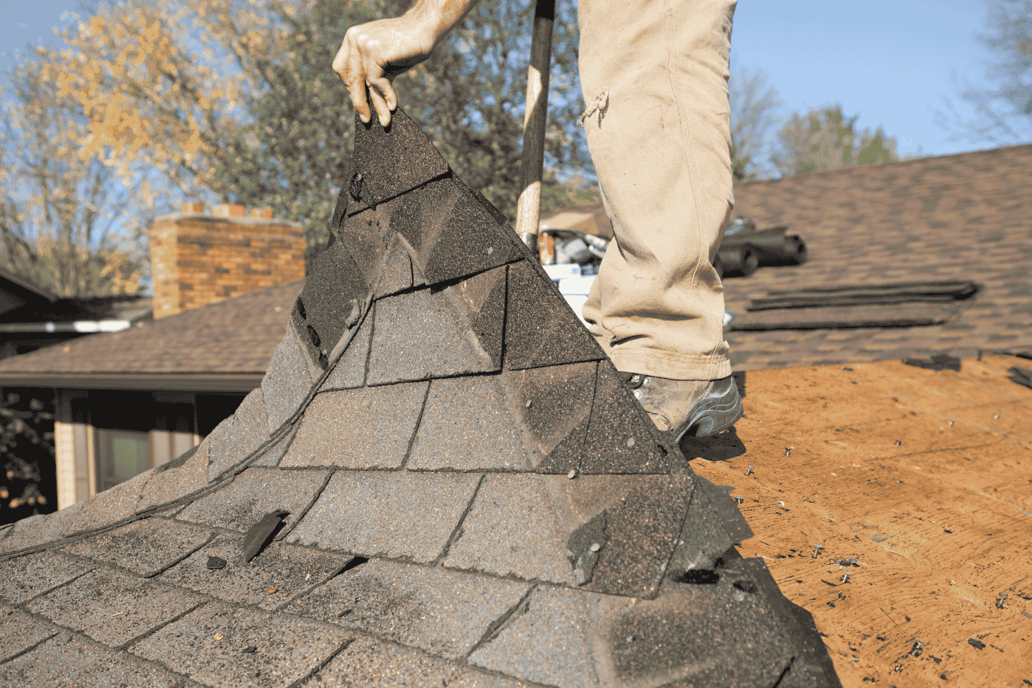 An illustration showing the drawbacks of installing new shingles over an existing roof.