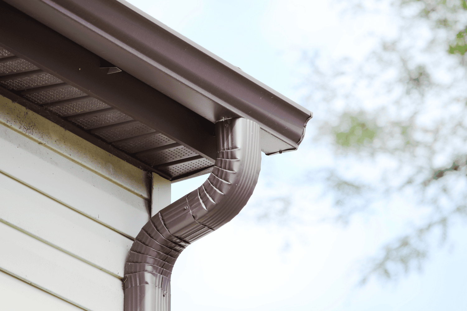 A diagram illustrating the components of a downspout cleanout.