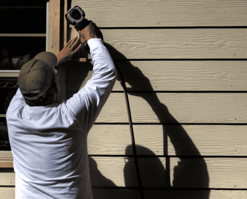 A visual representation of the siding installation timeline showcasing various stages of the process