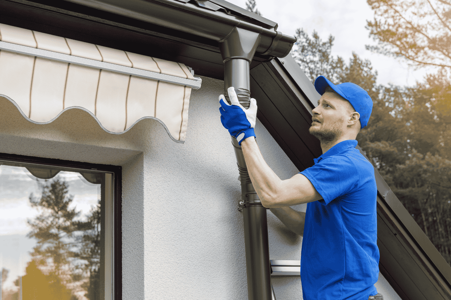 Emergency roof and gutter repair services in action, addressing leaking gutters.