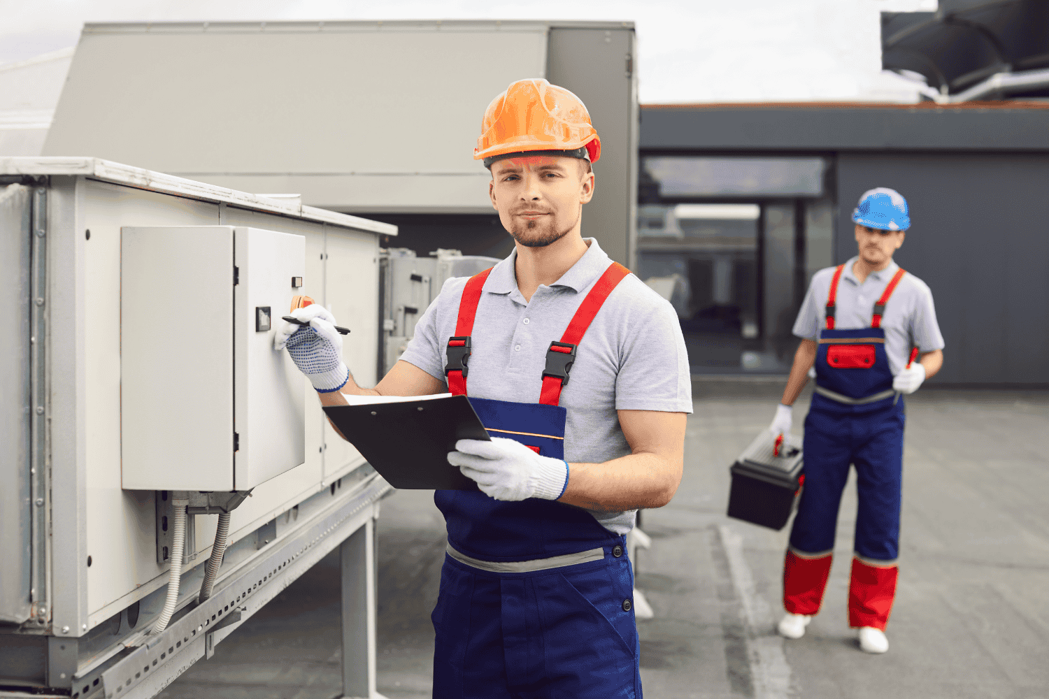 How to perform a basic flat roof inspection with an inspector examining a roof.