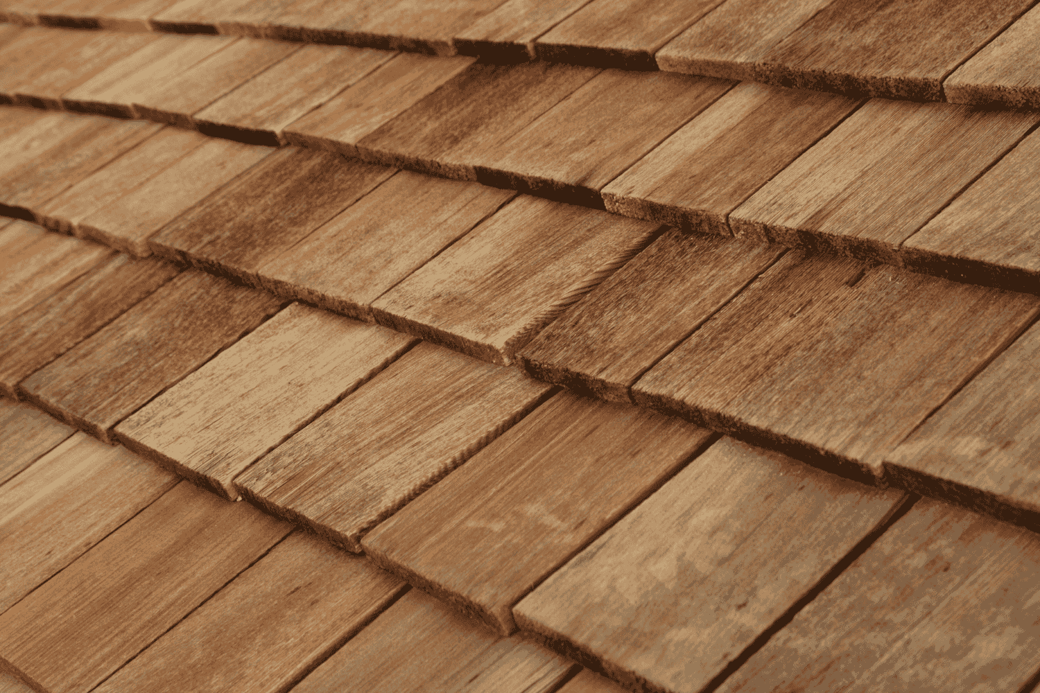 A close-up of wood shingles, showcasing their natural beauty.