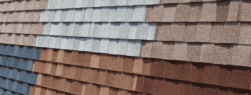 A variety of asphalt shingles displayed in different colors and styles, showcasing the popular choice for roofing.