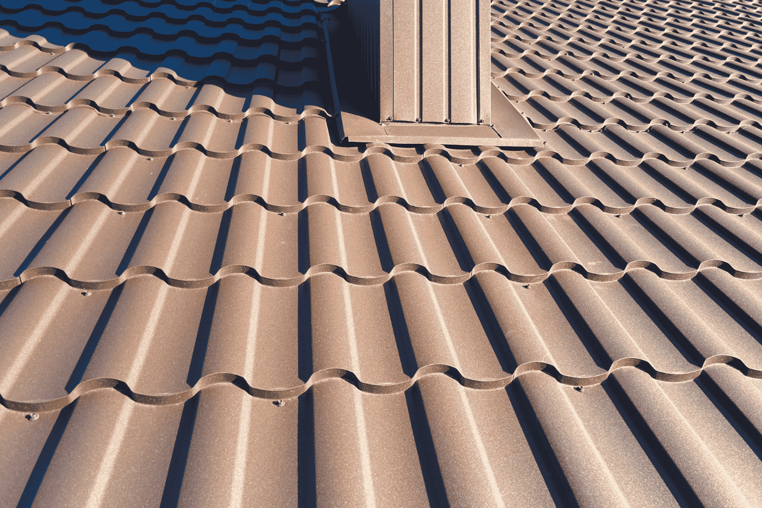 Metal shingles installed on a modern home, demonstrating durability and versatility.